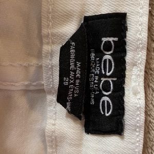 NWOT white mini skirt . Size 28